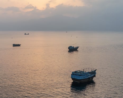 Boats anchored off Oman's northern Musandam Peninsula near the Strait of Hormuz