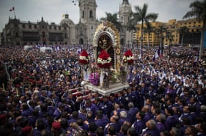 Thousands of people participate in a procession honouring ‘the Lord of Miracles’ in Lima