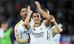 Lucas Vázquez applauds the fans, backed by Jude Bellingham, after Real Madrid’s dramatic late win against Alavés