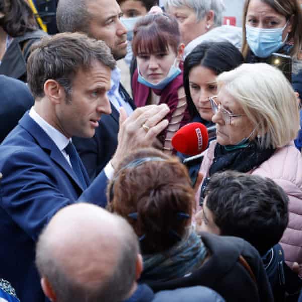Macron amid crowd