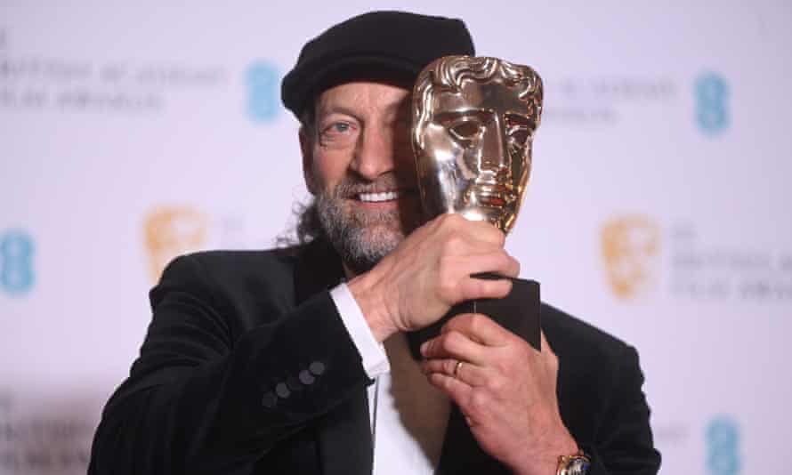 Coda star Troy Kotsur with his Bafta for best supporting actor.