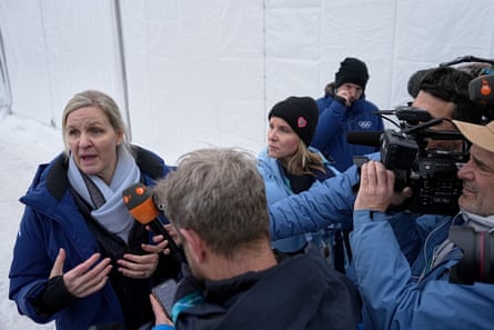 The International Olympic Committee president, Kirsty Coventry, tries to explain the decision to disqualify Heraskevych to the media