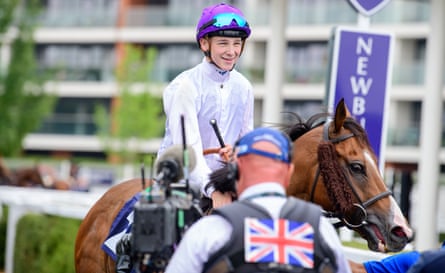 Billy Loughnane returns to the paddock at Newbury racecourse after winning on Rhythm N Hooves