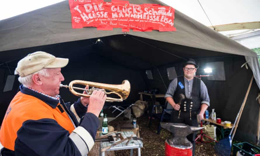 Musician outside the tent