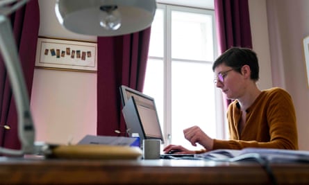 woman works on computer