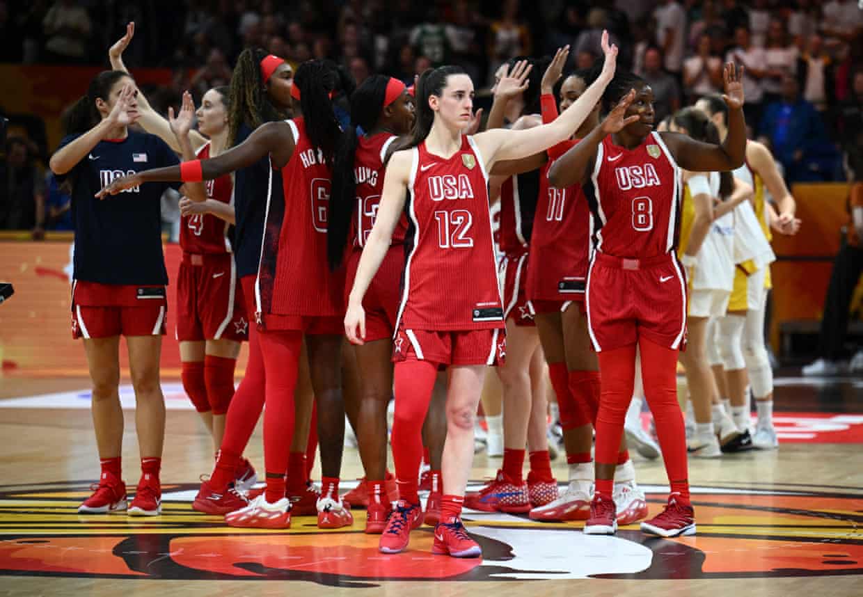Caitlin Clark and her USA teammates celebrate after beating Spain 76-66 to reach the Fiba Women’s Basketball World Cup final in Berlin.