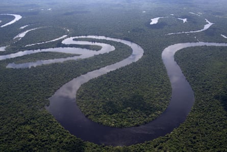 Aerial photo shows the Nanay River winding through Peru’s Amazon jungle near Iquitos