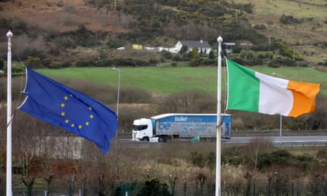 The EU flag and national flag of Ireland fly in the grounds of the Carrickdale hotel in Ireland