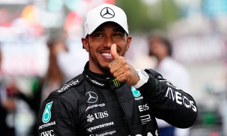 Lewis Hamilton gives a thumbs-up sign after second place in Barcelona
