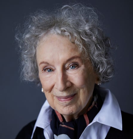 Headshot of Margaret Atwood against blue-grey background
