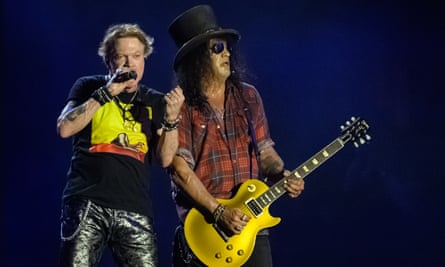 Axl Rose onstage with Slash during Guns N’ Roses’ headline performance at Glastonbury 2023.