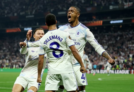 Youri Tielemans celebrates scoring their first goal with Ezri Konsa