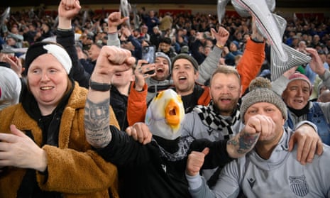 Grimsby Town fans celebrate the FA Cup fifth round victory over Southampton.