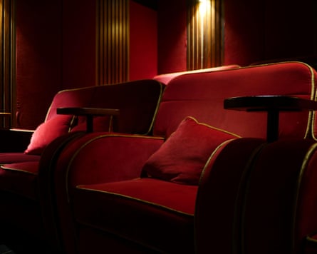 Plush red velvet seat in an Everyman cinema