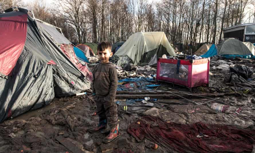 A five-year-old Kurdish boy from Iraq at a camp near Dunkirk, northern France