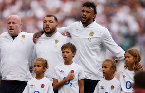 England's Courtney Lawes line up during the national anthems his children before earning his 100th England cap.