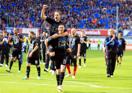 Paderborn players celebrating their promotion to the Bundesliga in happier times in May 2014.