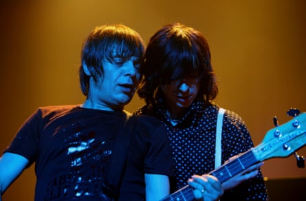 Mani playing with Primal Scream at the Brixton Academy, London, December 2006.