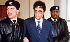 FILES-BRITAIN-LIBYA-LOCKERBIE-MEGRAHI-APPEAL<br>(FILES) In this file photo taken on February 18, 1992 convicted Lockerbie bomber Abdelbaset Ali Mohmet al-Megrahi (C) is escorted by security officers. - Five judges at Scotland’s highest court of criminal appeal on January 15, 2021 issue their ruling in a posthumous appeal by the family of Lockerbie bomber Abdelbased Ali Mohmet al-Megrahi. (Photo by MANOOCHER DEGHATI / FILES / AFP) (Photo by MANOOCHER DEGHATI/FILES/AFP via Getty Images)