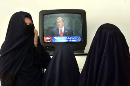 Iraqi women watching TV