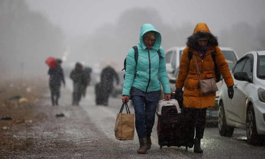 People at the Shehyni border crossing to Poland, outside Mostyska, Ukraine.