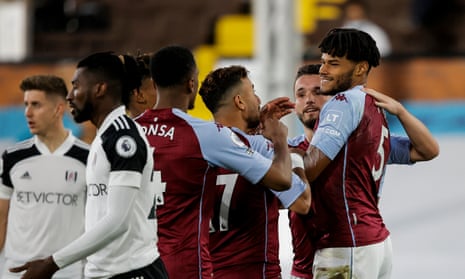 Tyrone Mings (right) celebrates after scoring Aston Villa’s third goal against Fulham at Craven Cottage.