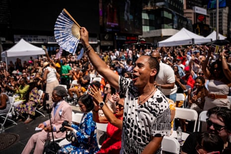 People cheer during the Broadway Celebrates Juneteenth concert at Times Square in New York City, on 19 June.