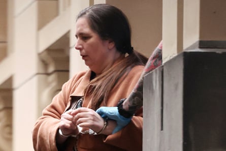 Erin Patterson is escorted out of the supreme court of Victoria