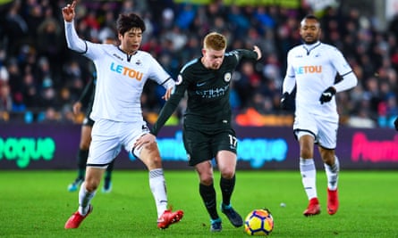 Man City star Kevin De Bruyne (centre) during their recent victory over Swansea City.