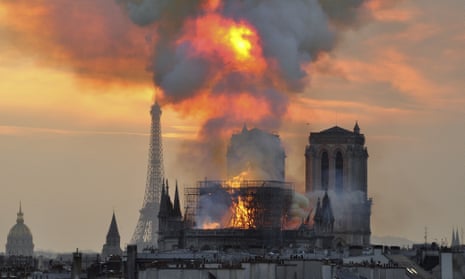 Flames and smoke rise from a blaze at Notre Dame Cathedral in Paris