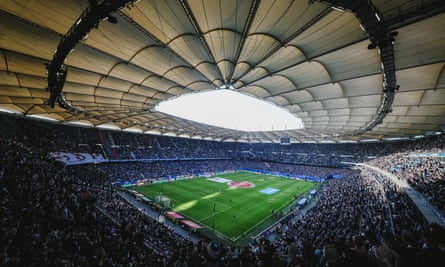 The full stadium for a match between Hamburger SV and FC St. Pauli.