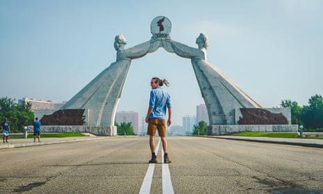 YouTuber Louis Cole in front of the Arch of Reunification in North Korea.