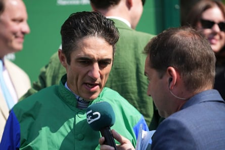 Christophe Soumillon speaks to a journalist holding a microphone