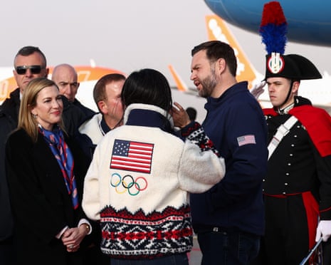US Ambassador to Italy and San Marino Tilman Fertitta (4th L) and his wife, Paige Fertitta, (2nd L) welcome US vice-president JD Vance (2nd R) and Second Lady Usha Vance (3rd R) as they arrive ahead of the Milano Cortina 2026 Winter Olympic Games in Milan.