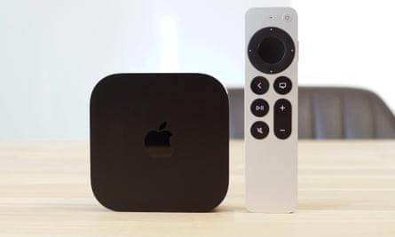 The Apple TV box and aluminium Siri remote.