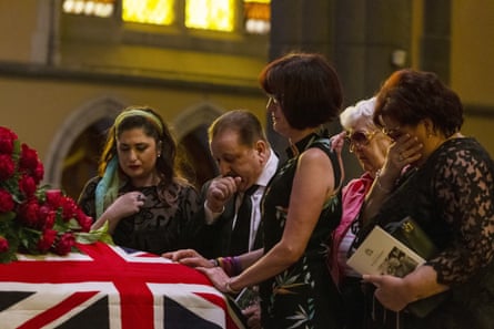 People pay their respects during the state funeral for Sisto Malaspina.