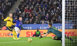 Harvey Barnes of Leicester City shoots under pressure from Calum Chambers of Arsenal.