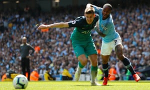 Tottenham’s Juan Foyth tussles with Manchester City’s Raheem Sterling.