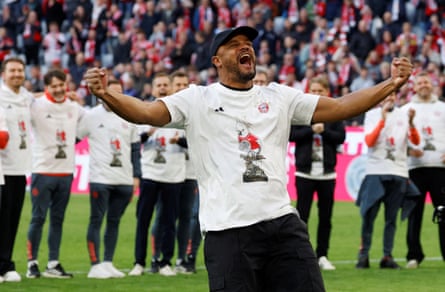Bayern Munich coach Vincent Kompany celebrates after winning the Bundesliga