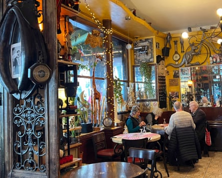 Interior of a Parisian brasseries with chandeliers and antiques