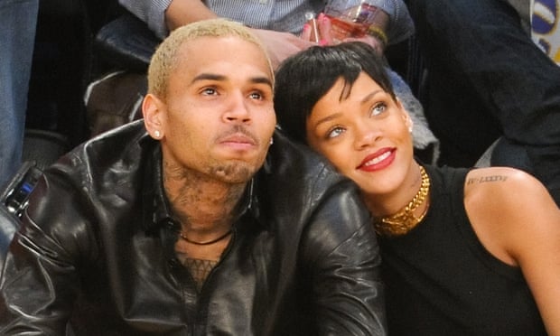 Chris Brown and Rihanna at a basketball game in 2012.