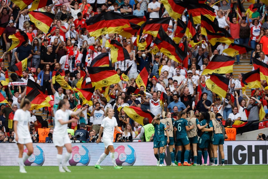 Germany’s players celebrate the equalising goal scored by Lina Magull.