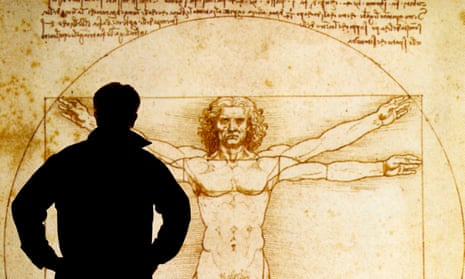 A man examines an electronic display of the Vitruvian Man by Leonardo da Vinci