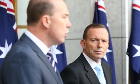 Tony Abbott and Peter Dutton at a press conference outside parliament in Canberra in June.