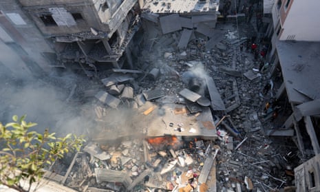 Destruction caused by an Israeli strike in Khan Younis, southern Gaza, 4 December.