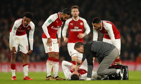Olivier Giroud receives treatment for his hamstring injury. The French forward is facing around three weeks out.