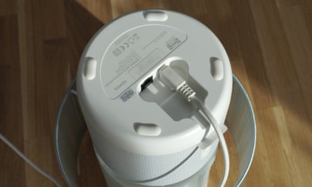 The bottom of the lamp base, showing the silicone feet and plug and ethernet sockets