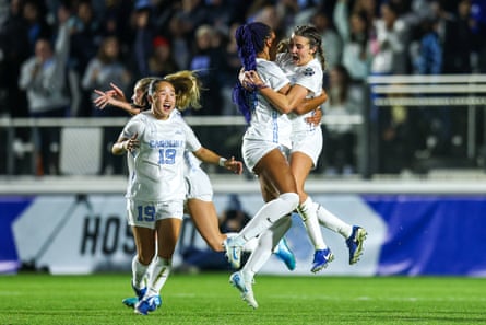 The UNC Tar Heels celebrate a December win against the Wake Forest Demon Deacons at WakeMed Soccer Park in Cary, North Carolina.