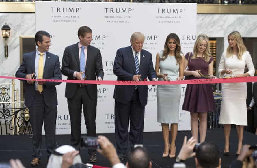Donald Trump opens his newest hotel with his family.