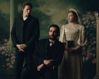 Charles and Adam Trask stand near seated Cathy Ames in a lace wedding gown, East of Eden